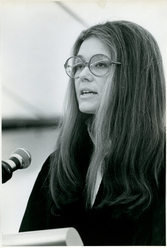 Gloria Steinem posed speaking at the 1973 Simmons Commencement