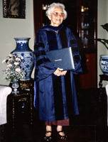 The Princess Mother of Thailand posed with her honorary degree from Simmons College