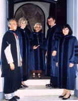 The Princess Mother of Thailand posed with Simmons College President William Holmes and unidentified others