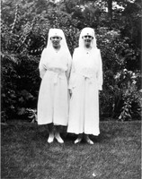 Two members of the Class of 1919 dressed in their war work nursing uniforms