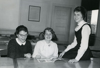 Christian Science Club members reading a magazine, c. 1959