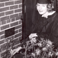 1958 - Class president planting ivy.jpg